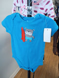 Blue Surfing Dog Baby Onesie