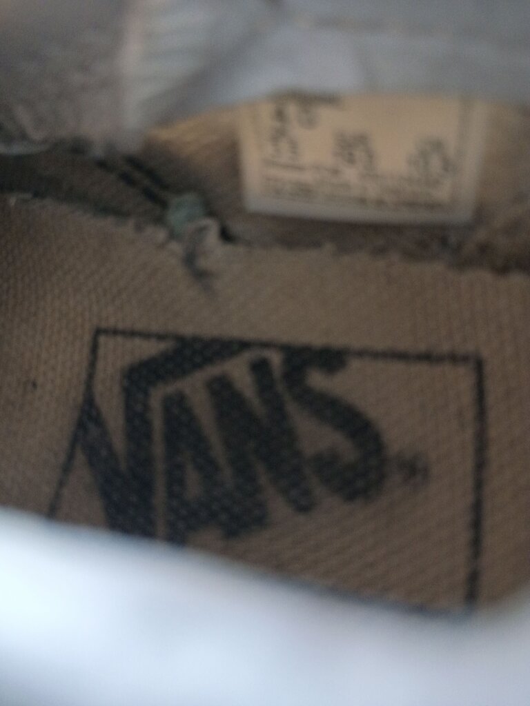 Vans Black and White Checkered Slip-On Shoes